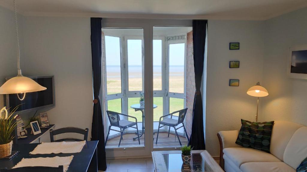 Appartement 180° Panoramameerblick - Ferienwohnung Sandkorn Am Sahlenburger Strand 7, 27476 Cuxhaven