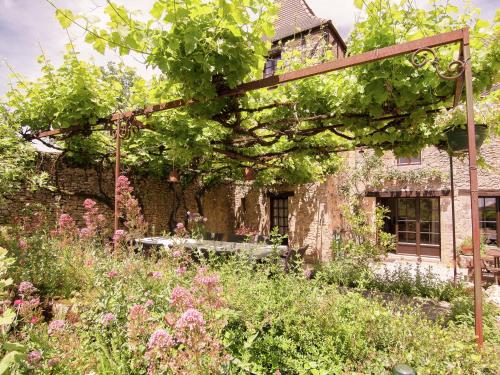 A romantic hamlet with lush gardens on a hill Meyrals france