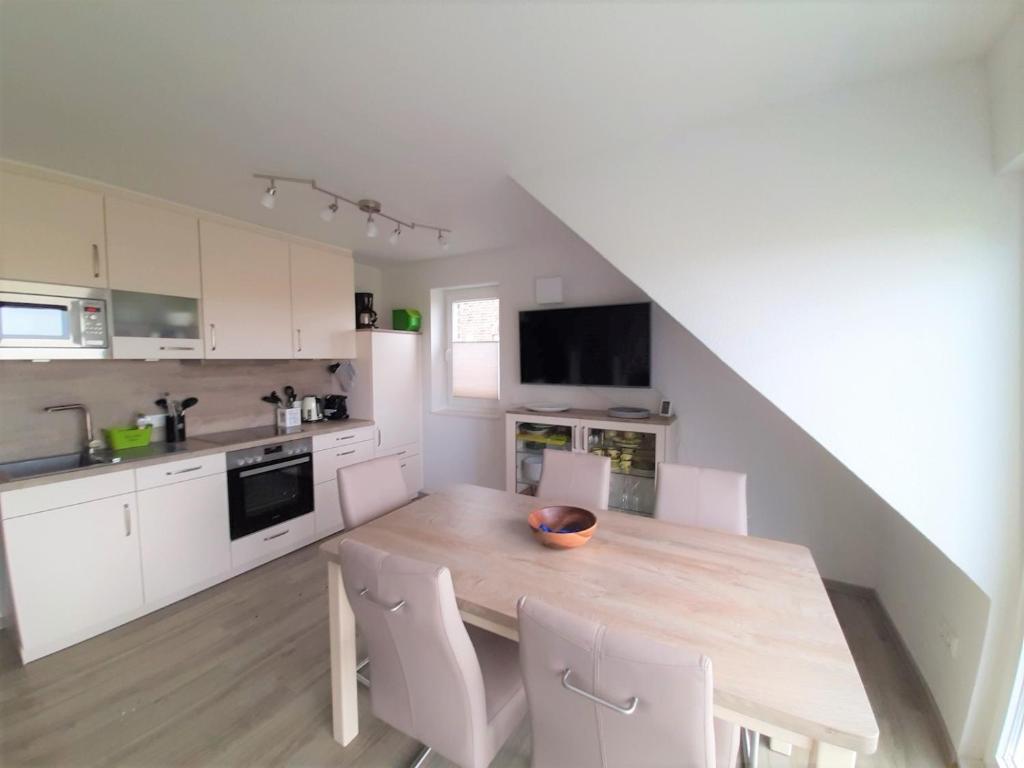 Appartement Amselhaus Ferienwohnung Nordseenest Neßmersiel Amselstr. 19g, 26553 Nessmersiel