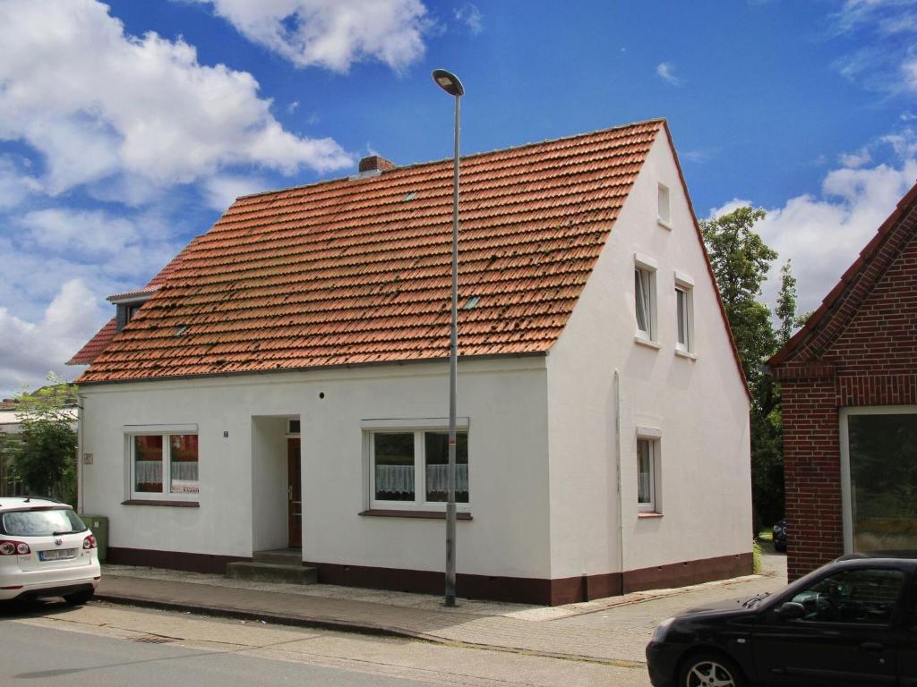 Appartement Apartment in Carolinensiel with a high chair and bed , 26409 Wittmund