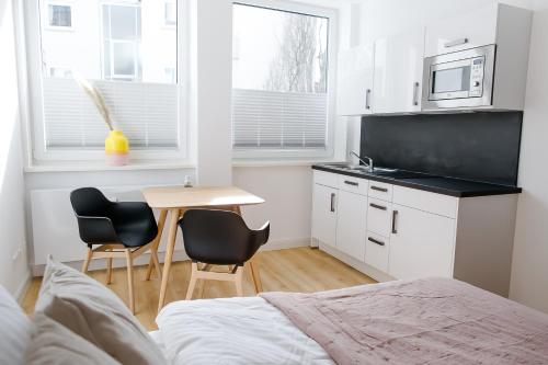 Louis & Louise Apartments & Rooms I Digital Check In