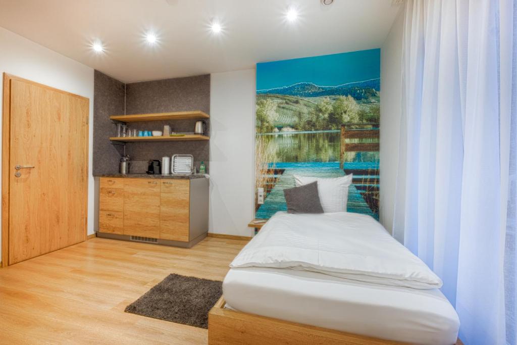 Pension Breitenauer See Langenfeld 7, 74245 Hößlinsülz