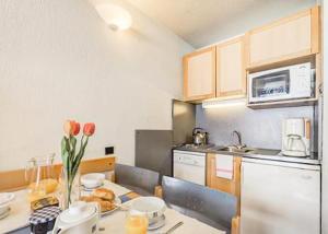 Tignes appart 4 pers /piscine/sauna/pied des pistes