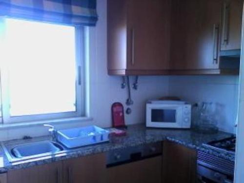 1 Bed Apt with pool, sauna, BBQ, Gym.