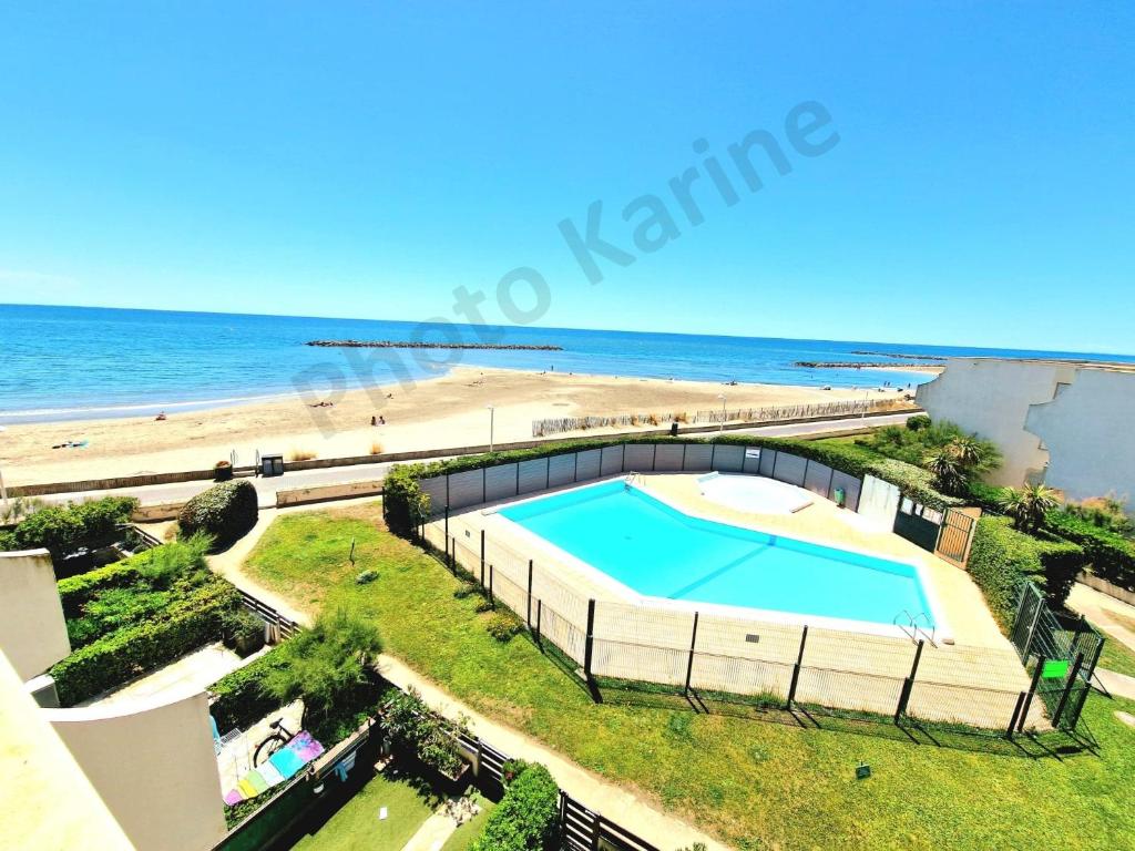 Appartement Appartement 1ere ligne piscine terrasse au bord de la plage front de mer avec 6 vélos 879 Avenue de l'Évêché de Maguelone, 34250 Palavas-les-Flots