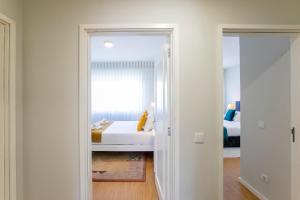 3BR Apartment with Balcony and Free Parking by LovelyStay