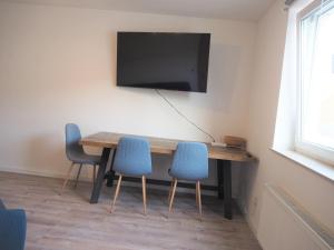 58-Zoll SmartTV & Kaffeevollautomate nahe Campus