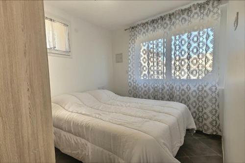 Agréable appartement climatisé à 25m de la plage