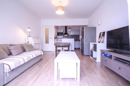 Air-conditioned apartment near the beaches with furnished balcony & parking