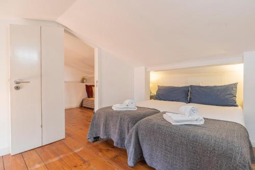 Alfama 2BDR Duplex Apartment W/ Balcony by LovelyStay