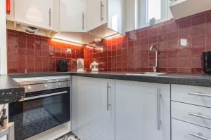 Alfama 2BDR Duplex Apartment W/ Balcony by LovelyStay