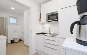 Amazing apartment in Lembruch-Dmmer See with 2 Bedrooms, WiFi and Indoor swimming pool