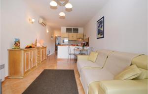 Amazing apartment in Pianottoli Caldarello with 1 Bedrooms, WiFi and Outdoor swimming pool
