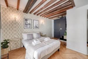 Appartement AMAZING HISTORICAL PARISIEN LOFT NEXT TO LOUVRE AREA ! 64 Passage Choiseul 75002 Paris Île-de-France