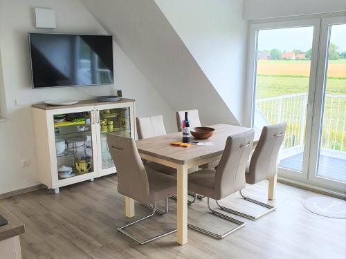 Amselhaus Ferienwohnung Nordseenest Neßmersiel