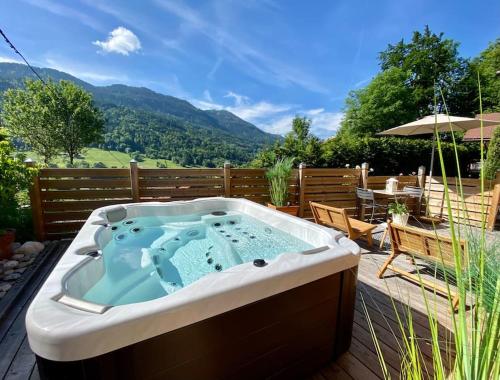 Androsace Appartement dans Chalet bois avec Jacuzzi privatif Terrasse et Vue Montagne