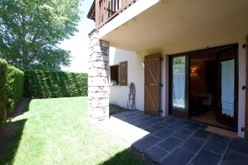 Apartamento con jardín Err