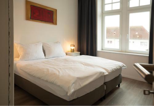 Apartment direkt am Hafen - mit Terrasse und UHD TV