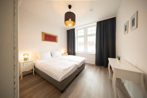 Apartment direkt am Hafen - mit Terrasse und UHD TV