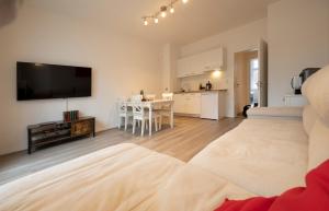 Apartment direkt am Hafen - mit Terrasse und UHD TV