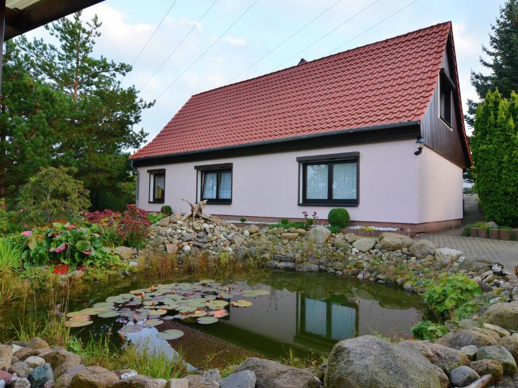 Apartment in the Harz with a log cabin pond and covered seating area , 38889 Wienrode