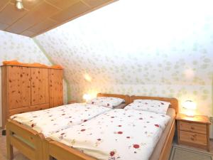 Apartment in the Harz with a log cabin pond and covered seating area