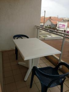 Appart 2ème étage avec balcon et place de parking