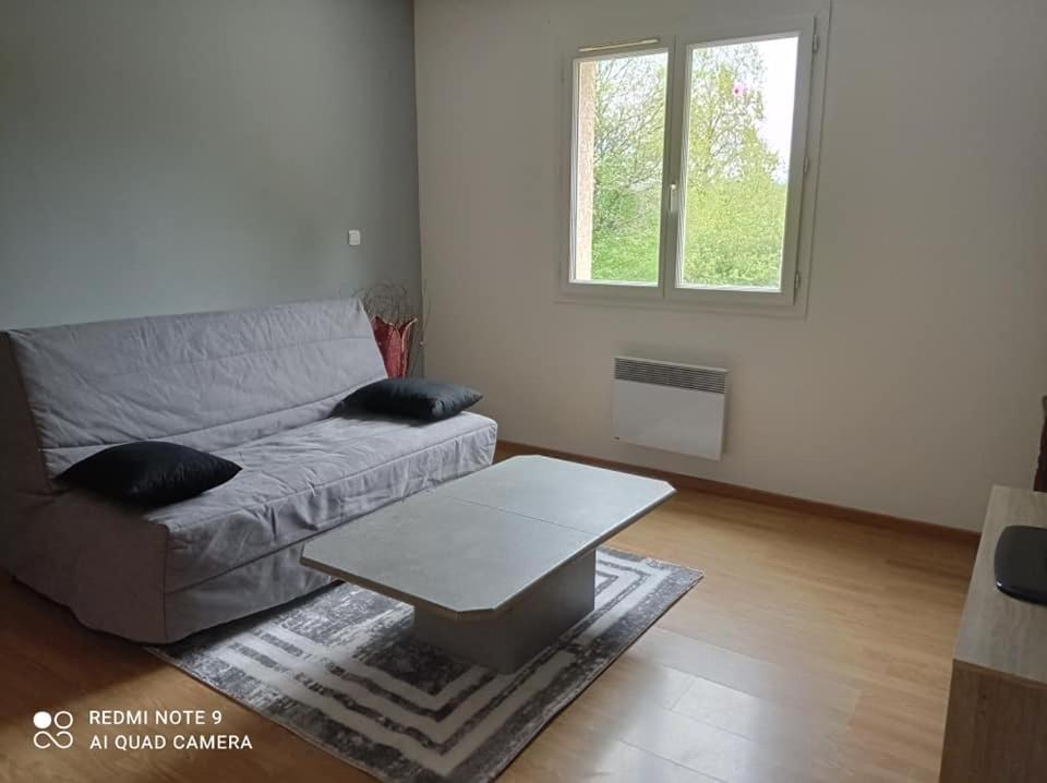 Appart 2ème étage avec balcon et place de parking