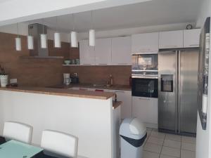 Appart ARCAIM, climatisé 90m2, 4 chambres, à 200m de la plage