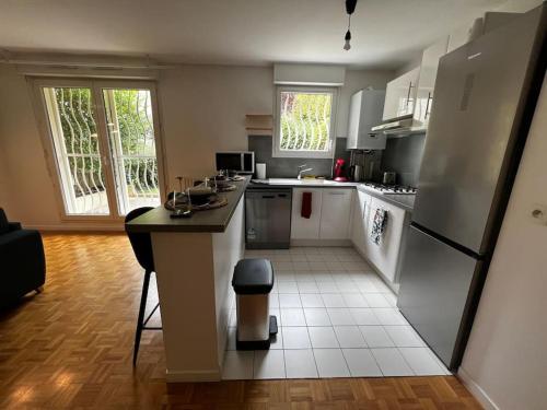 Appart calme avec jardin et parking. 15mn de Paris