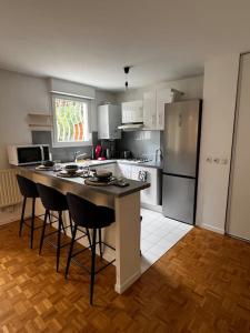 Appart calme avec jardin et parking. 15mn de Paris