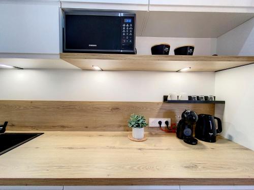 AppartChic - appartement standing - plein Centre & Parking privé