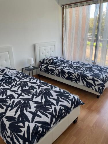 Appartement 2 chambres avec parking privé gratuit