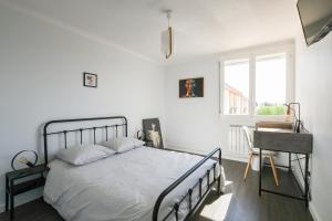 Appartement 3 chambres, climatisation, parking, proche centre ville