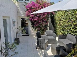 Appartement 50 m2 dans une maison privative avec terrasse et jardin privée