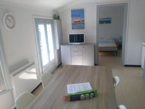 Appartement 62 m2 1er etage avec jardin au rdc