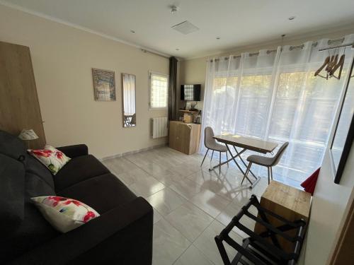 Appartement au calme dans un espace arboré