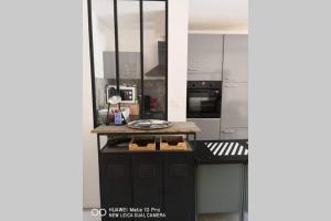 Appartement avec Jardin privatif centre ville