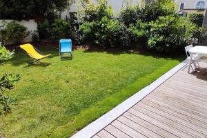 Appartement avec parking et jardin privé.