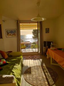 Appartement avec terrasse vue mer, proximité plage, place parking