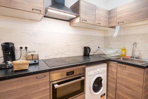 Appartement cœur de ville - Au calme - WiFi - Four, Lave-sèche Linge