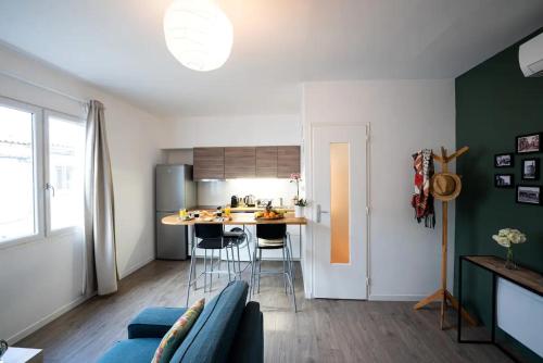 Appartement centre village, clim et parking gratuit