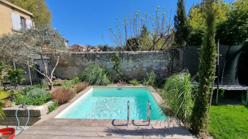Appartement chaleureux proche rempart accès jardin