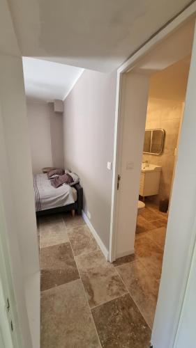 Appartement chaleureux proche rempart accès jardin