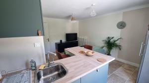 Appartement chaleureux proche rempart accès jardin