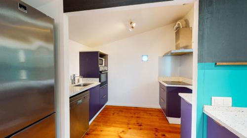 Appartement cosy avec jacuzzi et poêle à bois