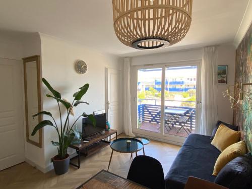 Appartement COSY avec piscine, accès direct plage