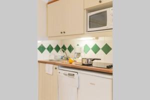 APPARTEMENT DANS RESIDENCE 4**** DANS UN CADRE LUXURIANT
