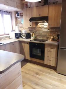 Appartement de 2 chambres avec wifi a Peone
