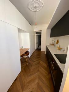 Appartement de maître T3 80m2 en plein centre.